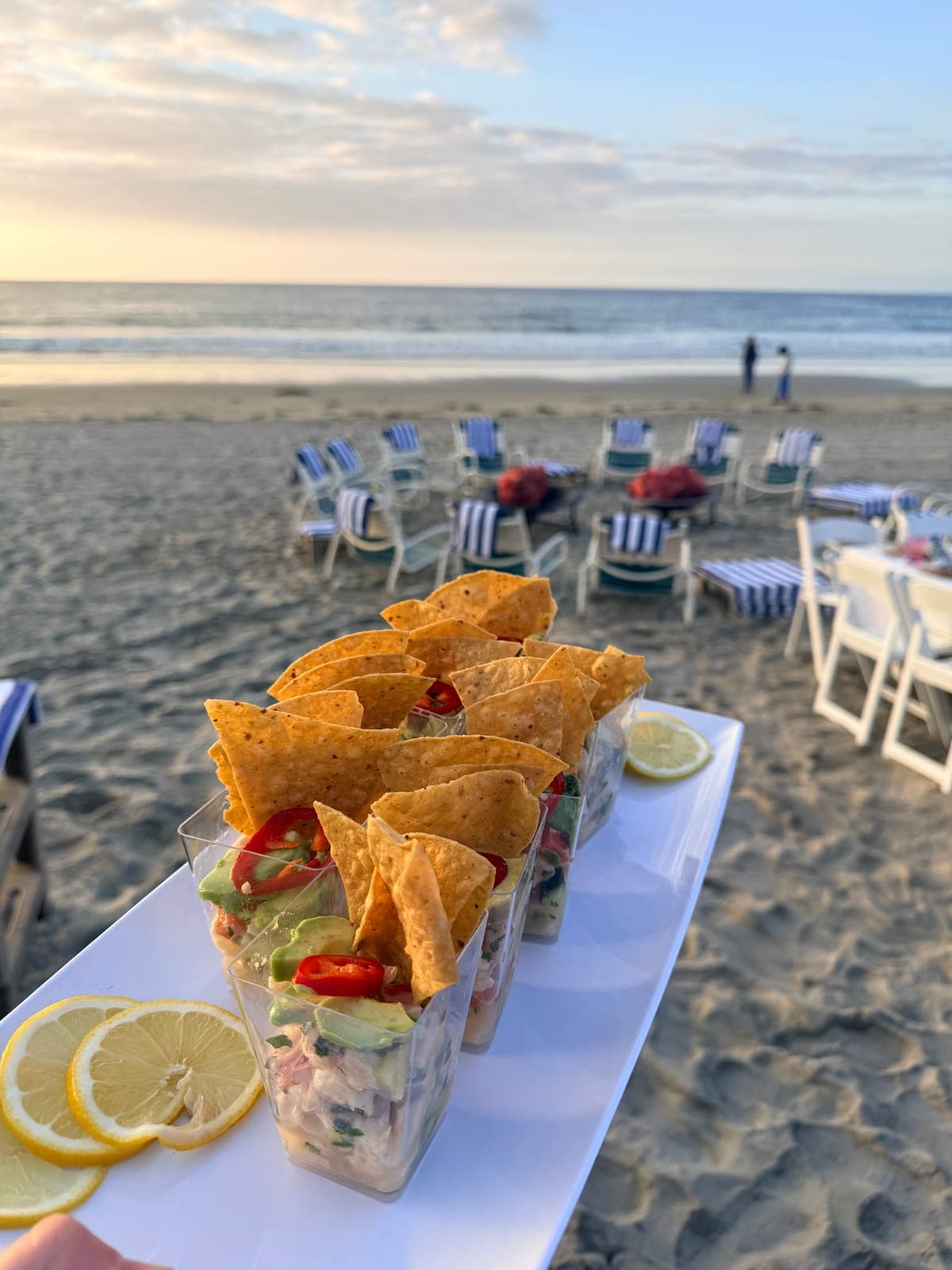 Ceviche cups with tortilla chips served at a San Diego beach catering event