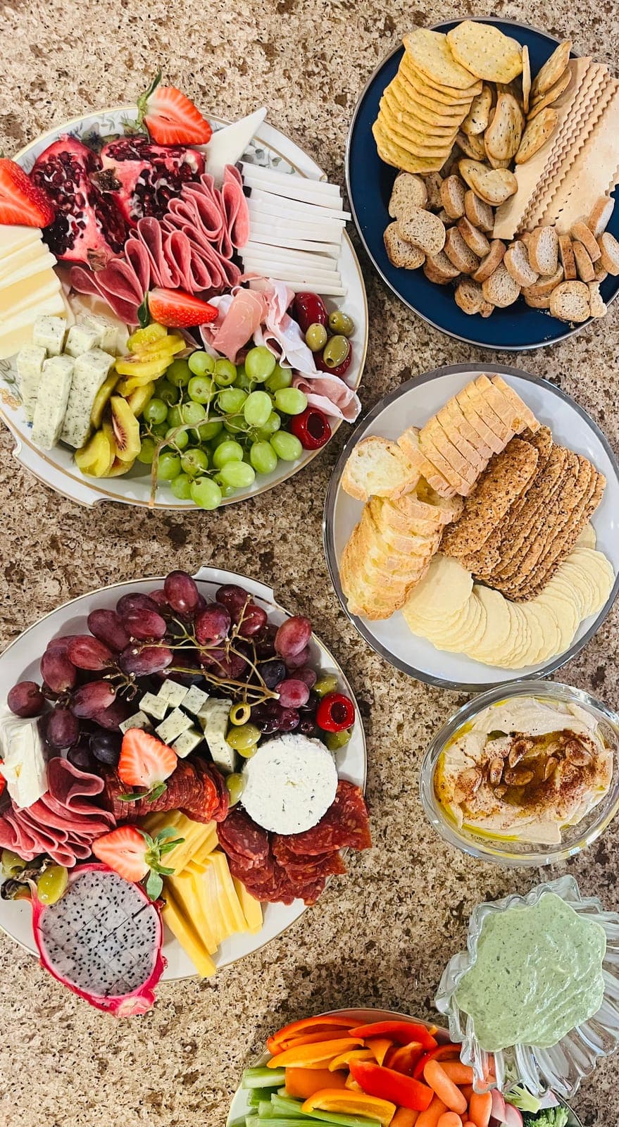 Charcuterie and cheese boards with fruit, crackers and hummus for a San Diego catered event